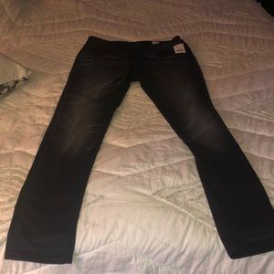 Buckle black skinny jeans